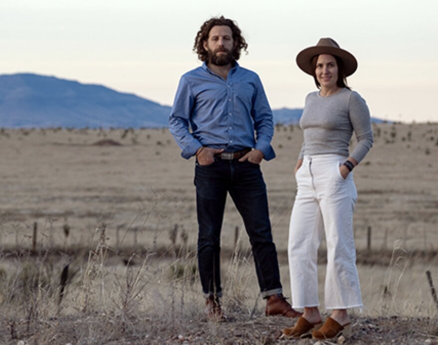 Max Kabat and Maisie Crow are the owners of West Texas Media Group, publisher of The Big Bend Sentinel and The Presidio International newspapers. When they acquired the company, they relocated the business to an in-town location and started to think about how they could make that real estate investment fund their newsroom operations but also support the community. (Photo credit: Jessica Lutz/jessicalutz.com)